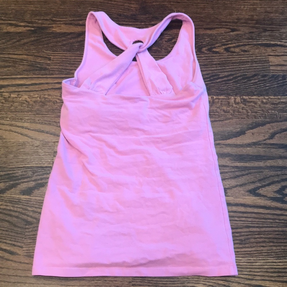 Pink workout tank with built in bra.